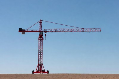 Red Tower Crane on Desert Plain