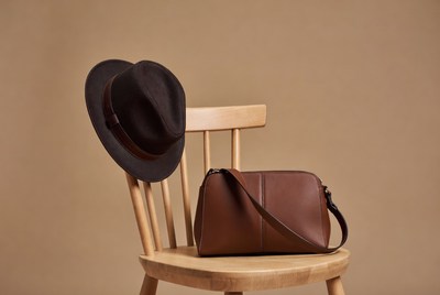 Brown Fedora Hat and Crossbody Bag on Chair