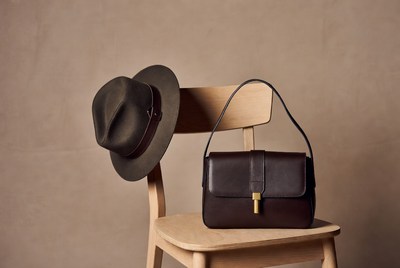 Brown Fedora Hat and Handbag on Chair