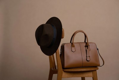 Brown Hat and Handbag on Chair