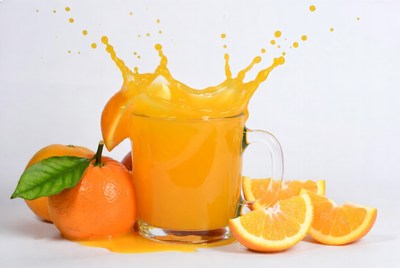 Orange Juice Splashing from Glass