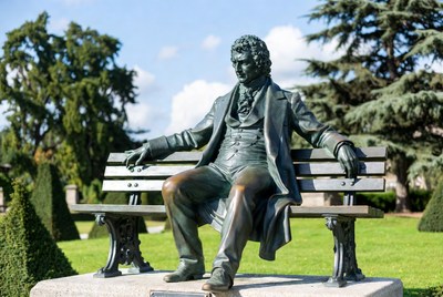 Bronze Statue Man Sitting on Bench