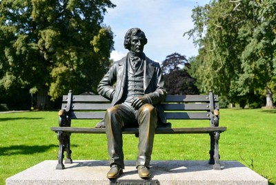 Bronze Statue Man Sitting on Park Bench
