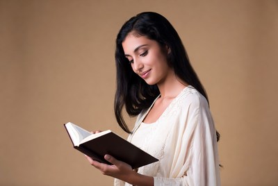Indian woman reading book