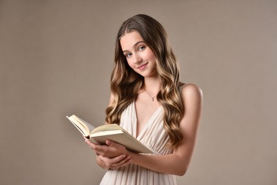 Young woman reading book