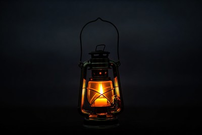 Vintage lit oil lantern