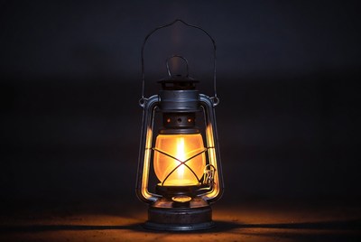 Vintage Lantern Glowing on Dark Background