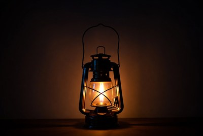 Vintage Lantern Glowing on Table