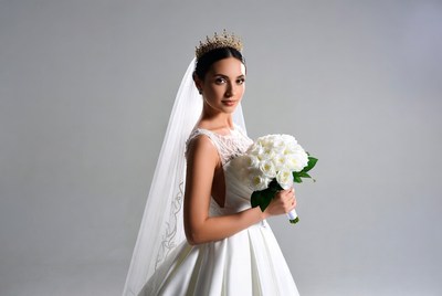 Bride holding white bouquet