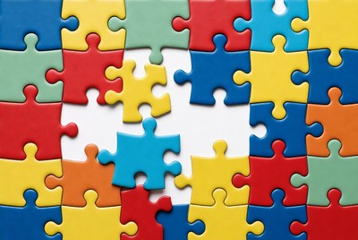 Colorful puzzle pieces on white background
