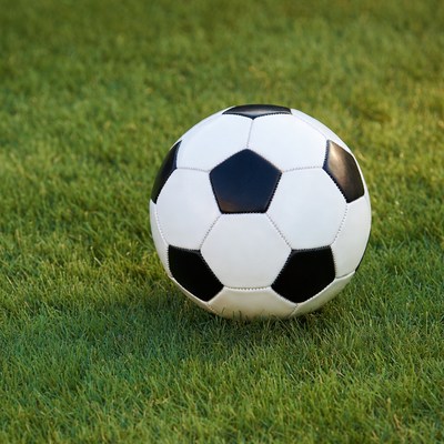 Soccer ball on green grass