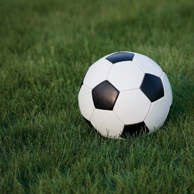 Soccer ball on green grass
