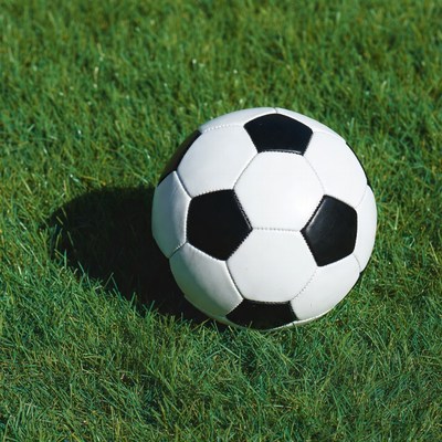 Soccer ball on green grass