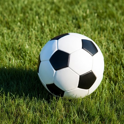 Soccer ball on green grass