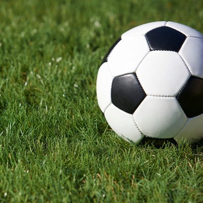 Soccer ball on green grass