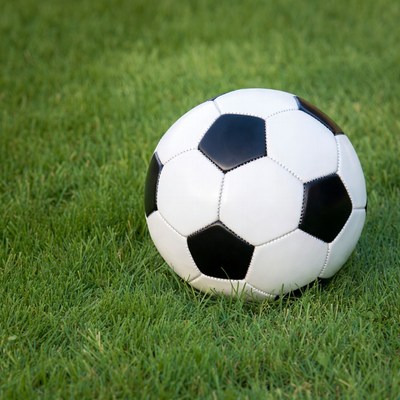 Soccer ball on green grass