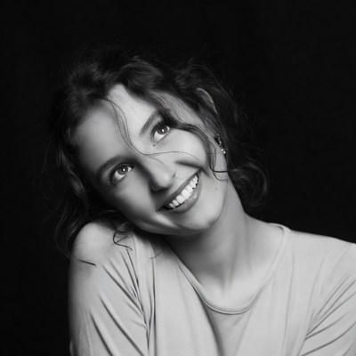 Smiling woman with curly hair