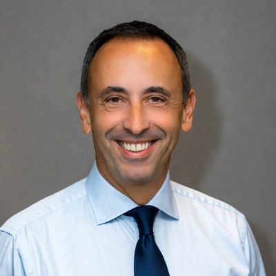 Smiling Middle Eastern man in suit