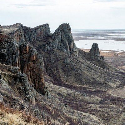 Jagged Rock Formations Overlooking Lake