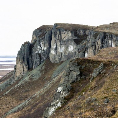Rugged Cliffs Overlooking Arctic Landscape