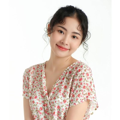 Asian woman in pink floral dress