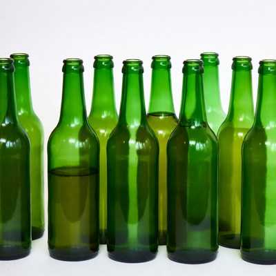 Green Beer Bottles on White Background