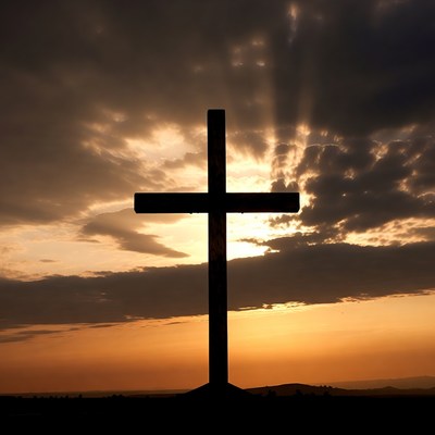Silhouette Cross at Sunset