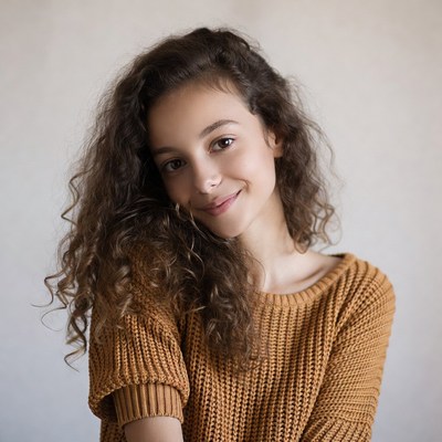 Smiling girl with curly hair