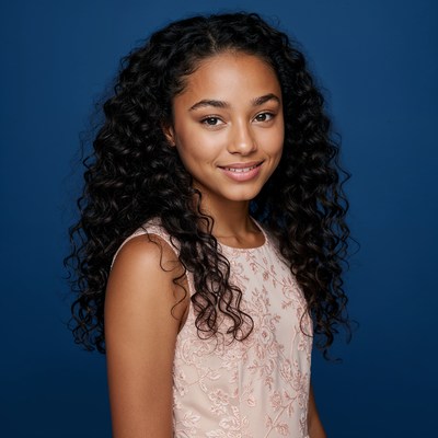 Smiling girl with curly hair