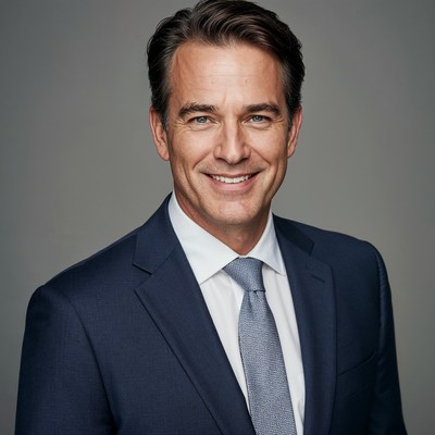 Smiling man in navy suit