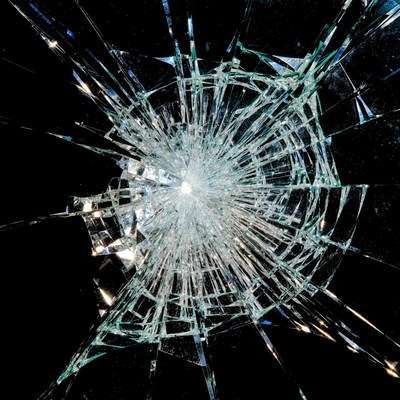 Cracked Glass Shards on Black Background