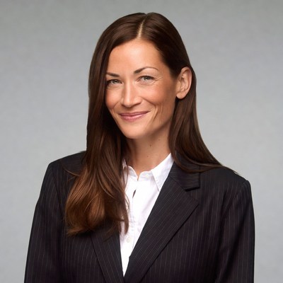Smiling woman in black suit