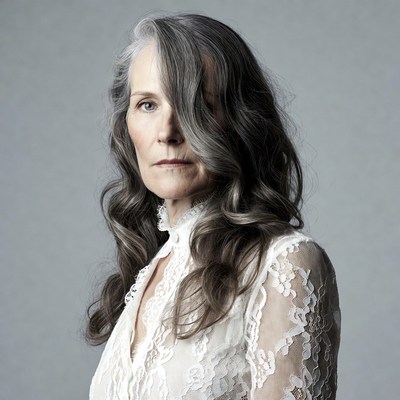 Elegant woman with gray wavy hair