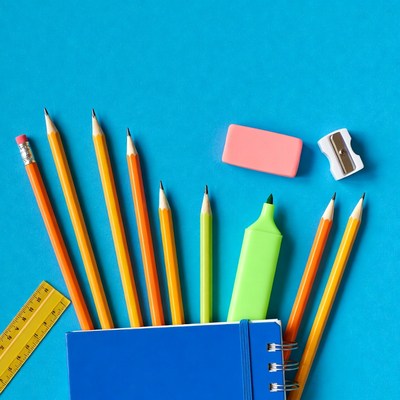 School supplies on blue background