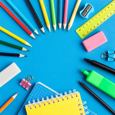 Colorful School Supplies on Blue Background