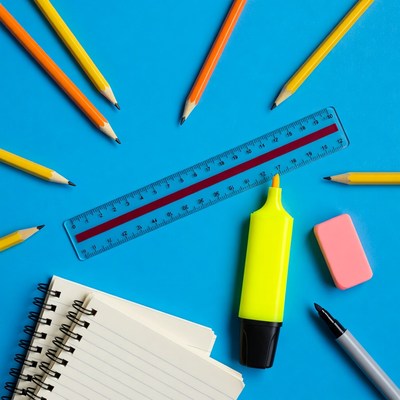 School supplies on blue background