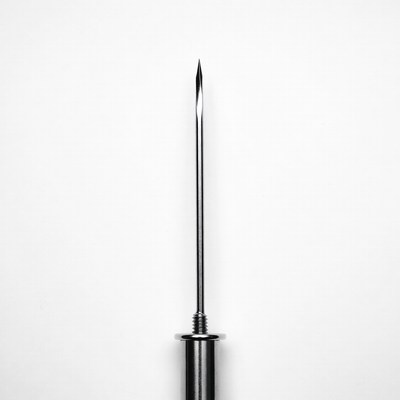 Sharp metal needle on white background