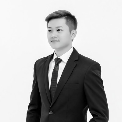 Asian man in black suit