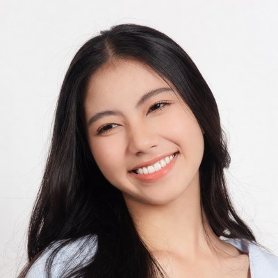 Smiling Asian woman with long black hair