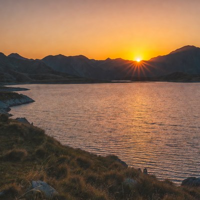 Sunset over mountain lake