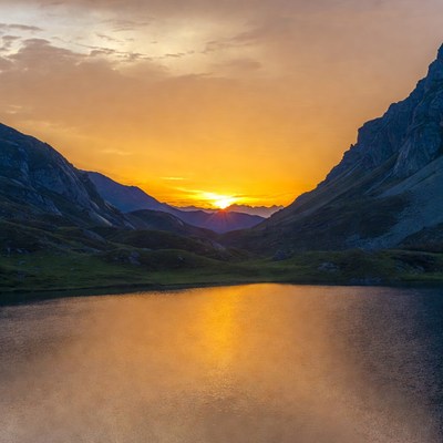 Sunset over mountain lake