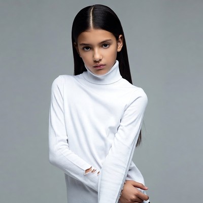 Latino girl in white turtleneck