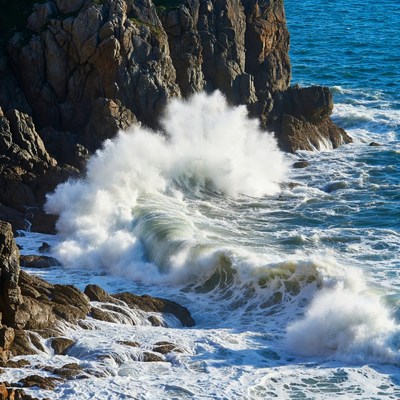 Ocean Waves Crashing on Rocky Coast