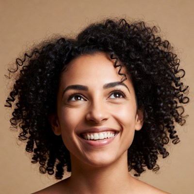 Smiling woman with curly hair