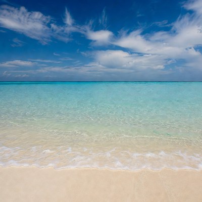 Turquoise Ocean Waves on Sandy Beach