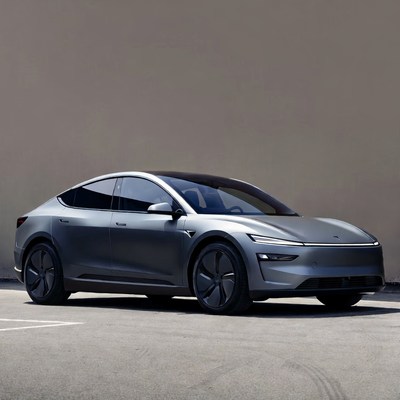 Silver Tesla Model Y on neutral background