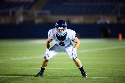 Football player in defensive stance