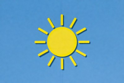 Yellow sun on blue background