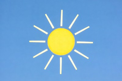 Yellow sun on blue sky