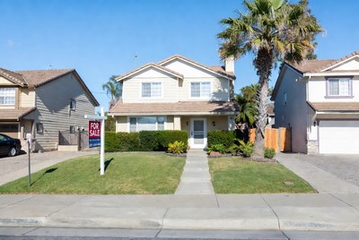 White House for Sale with Palm Trees